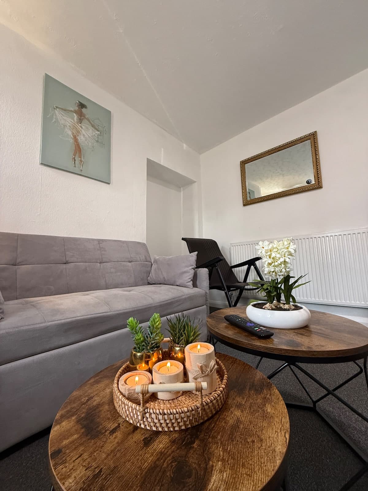 Living room with a large corner sofa and coffee tables